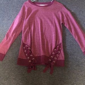 Maurice’s sweater. Never worn.